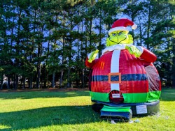 The20Green20Santa20Bounce20House201 1736560557 The Mean Green Santa Bounce House (Dry Only)