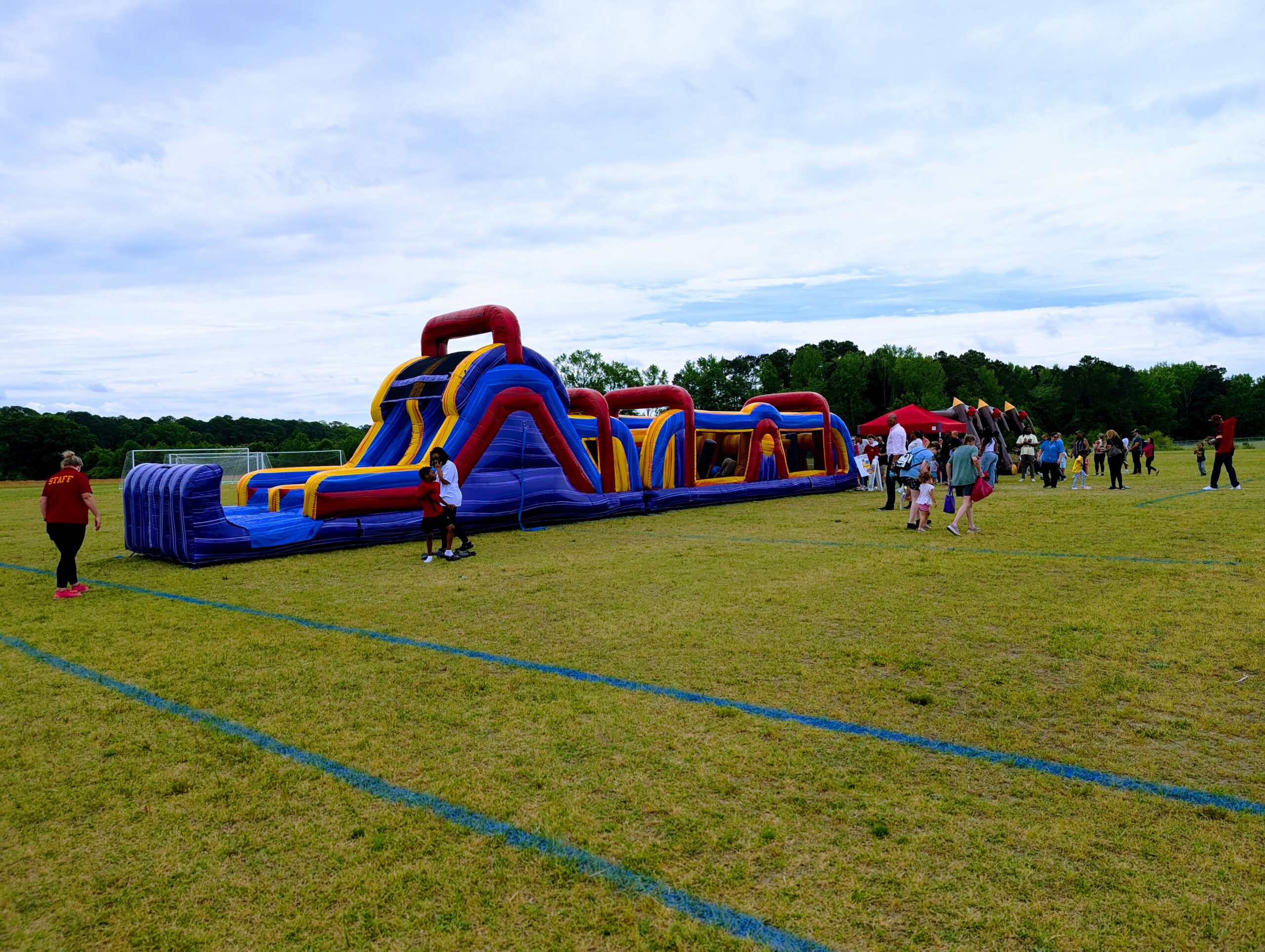 Inflatable obstacle course rental set up for a school field day in Eastern North Carolina