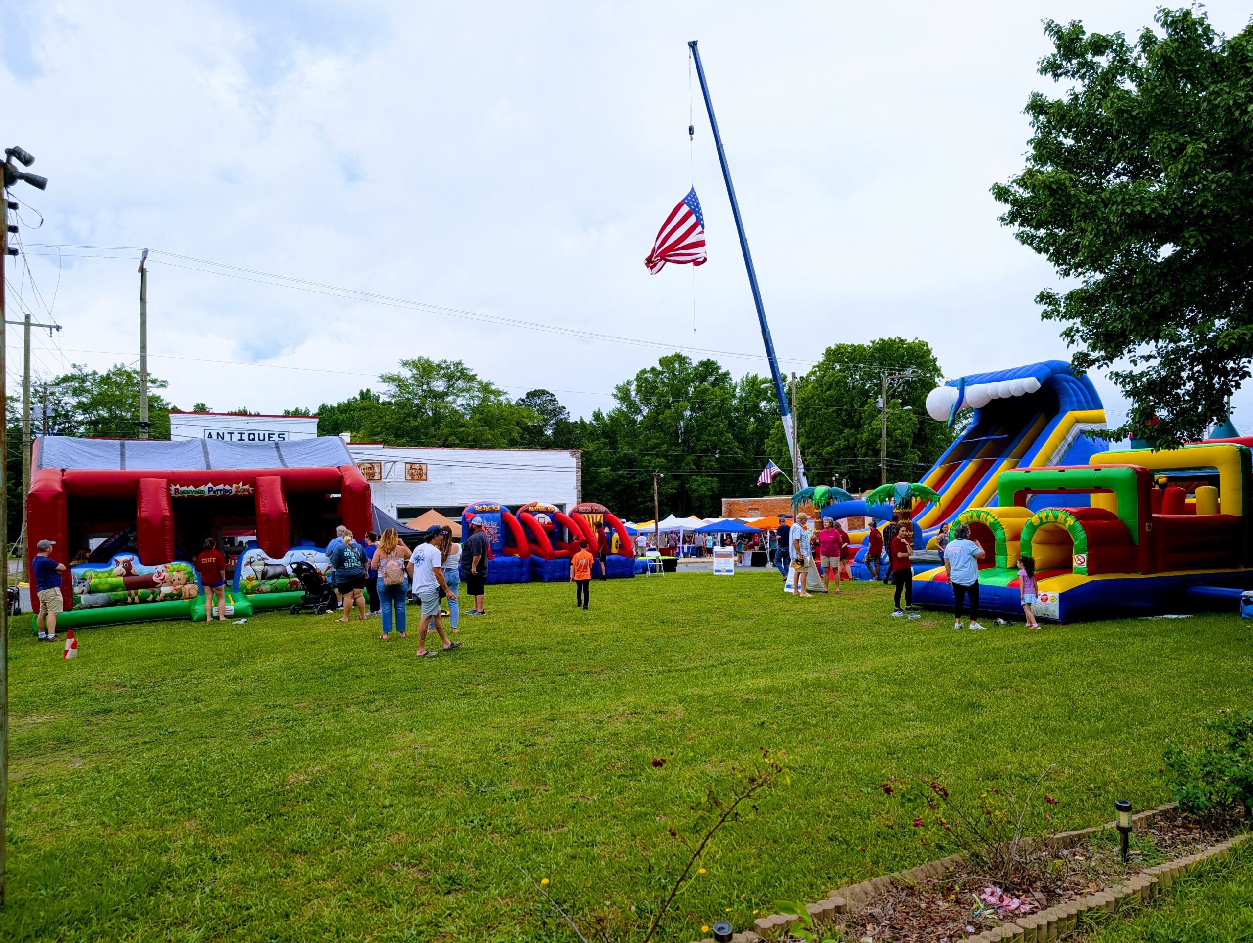 Multiple inflatables set up for a community festival in Eastern North Carolina by Inflatables NC