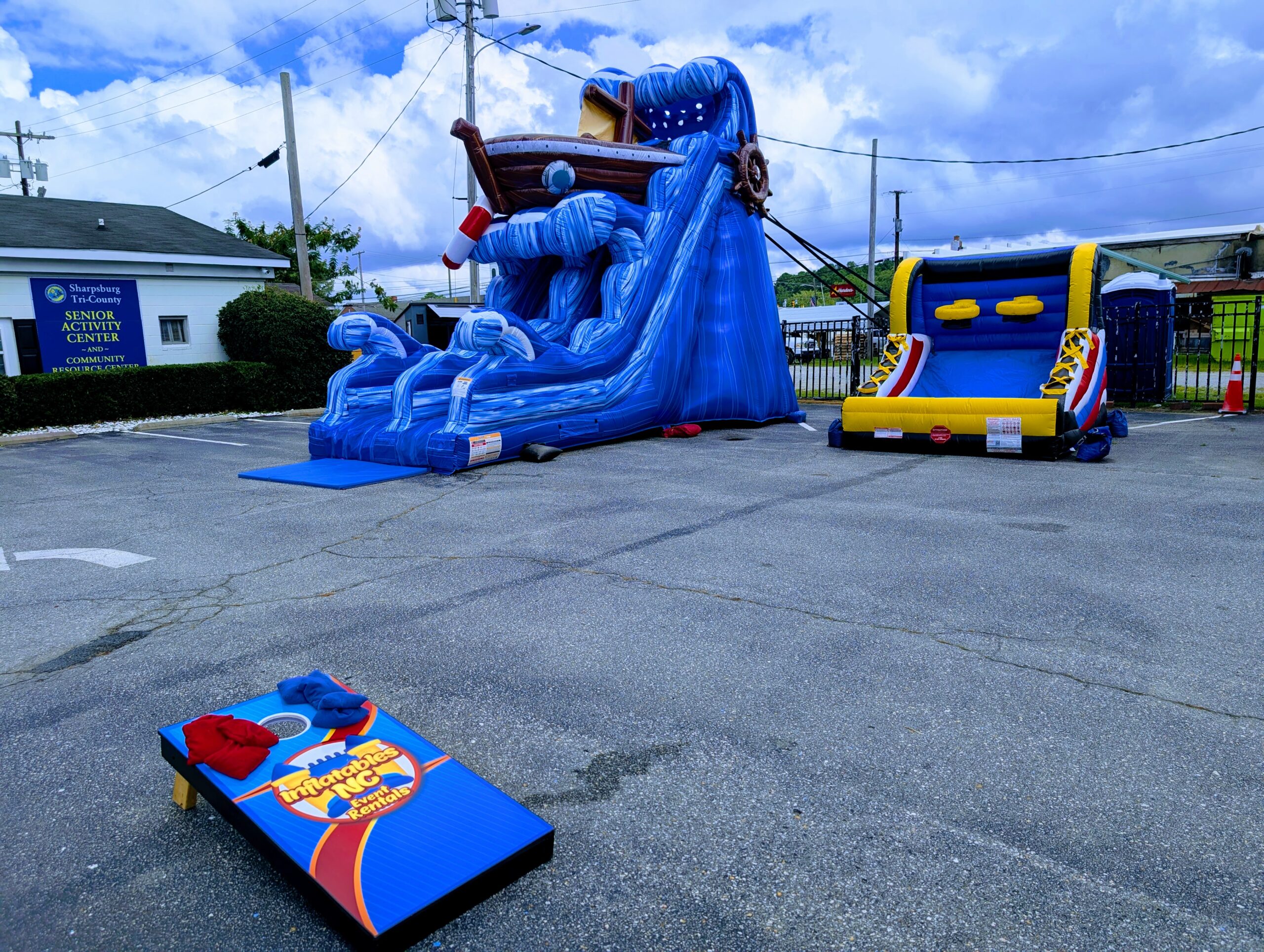 Inflatables NC delivery team setting up an inflatable on event day in Nash County, NC